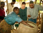 Tanya Stathers inspecting grain